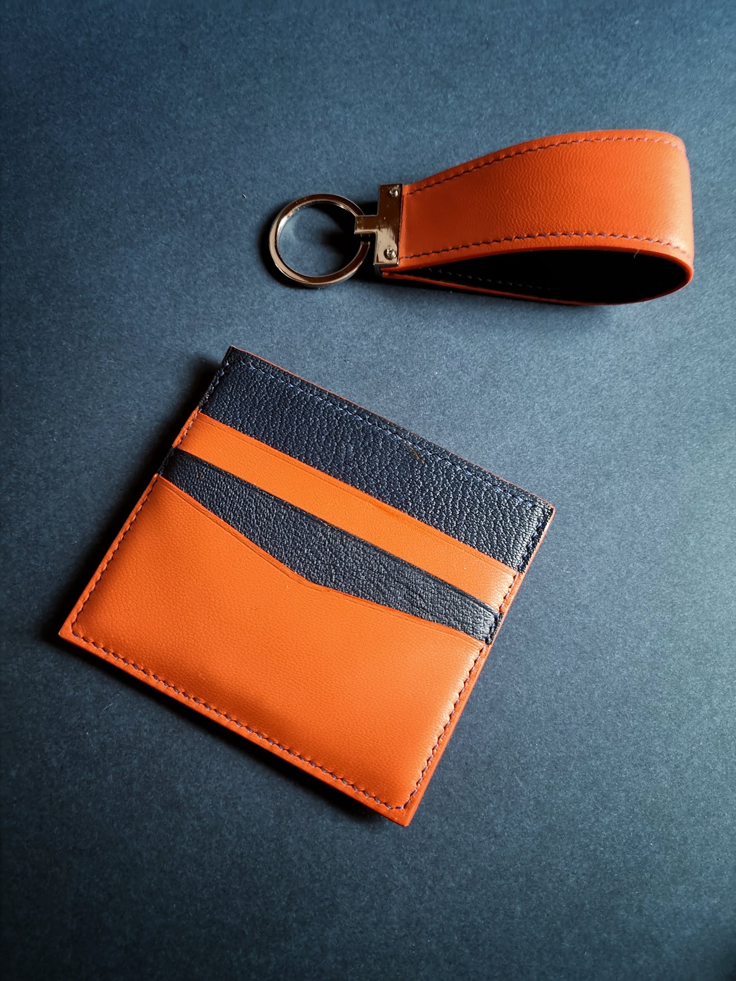 Monaco card holder in orange and navy blue